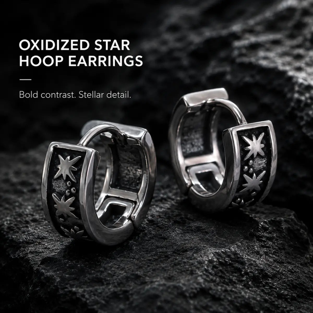 Oxidized Star Hoop Earrings Silver Pair Displayed on Stone Surface