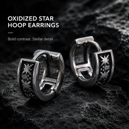 Oxidized Star Hoop Earrings Silver Pair Displayed on Stone Surface
