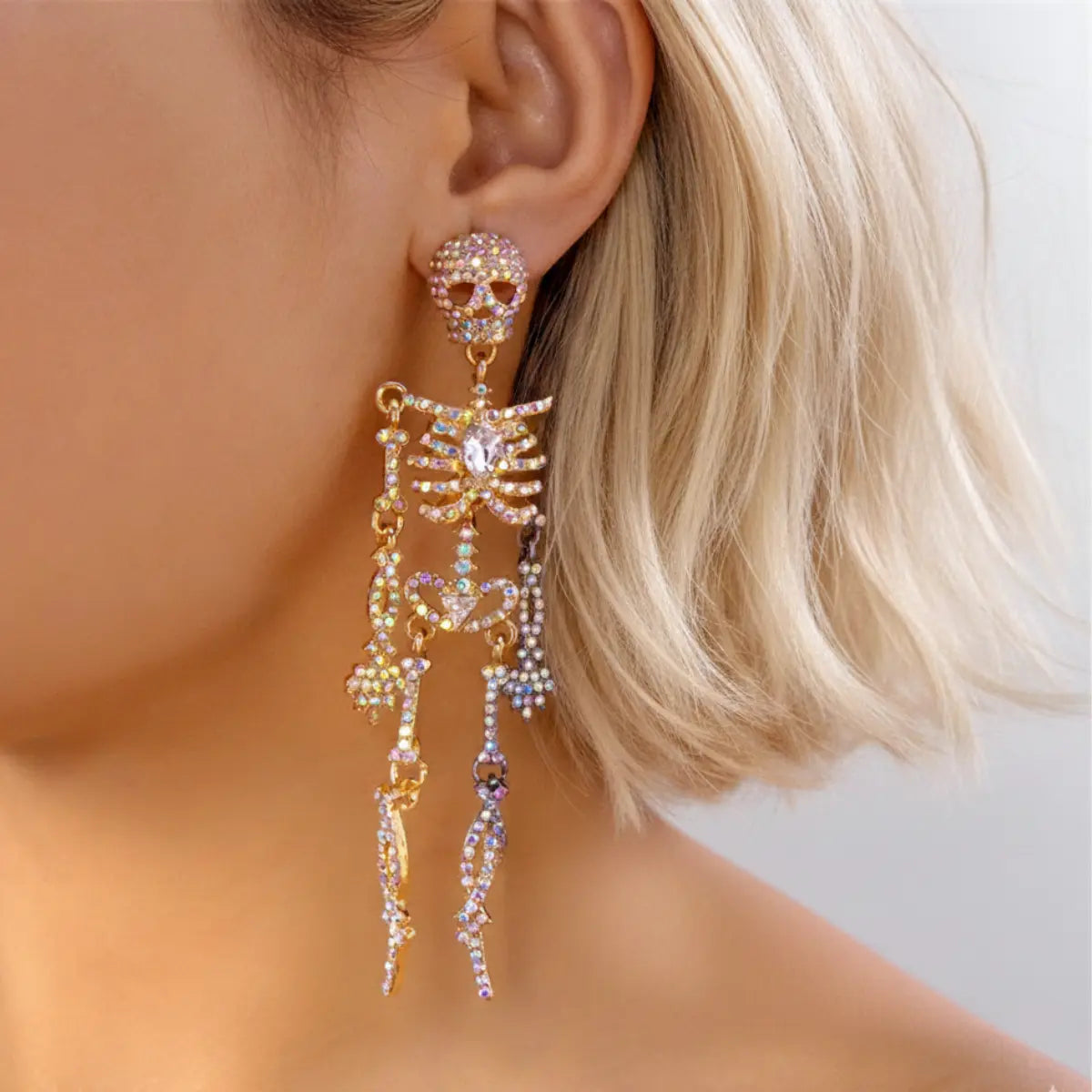 Pave Skeleton Halloween Earrings Gold Worn by Female Model