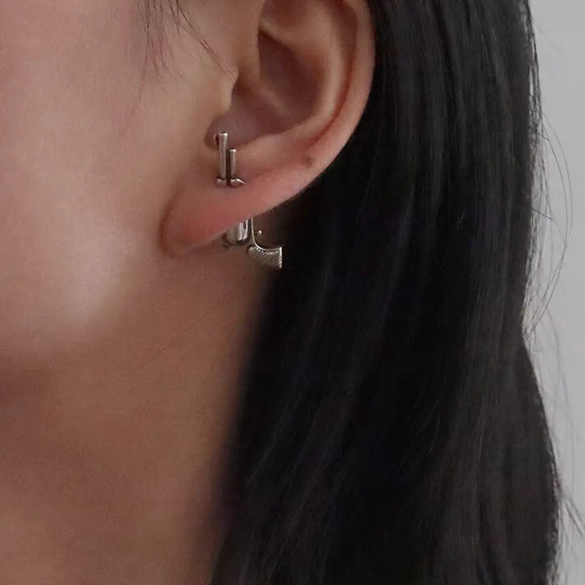 Pistol Stud Earrings Silver Worn By Female Model