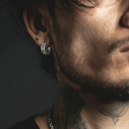 Poker Card Ace of Spades Skull Hoop Earrings Worn by Male Model Front