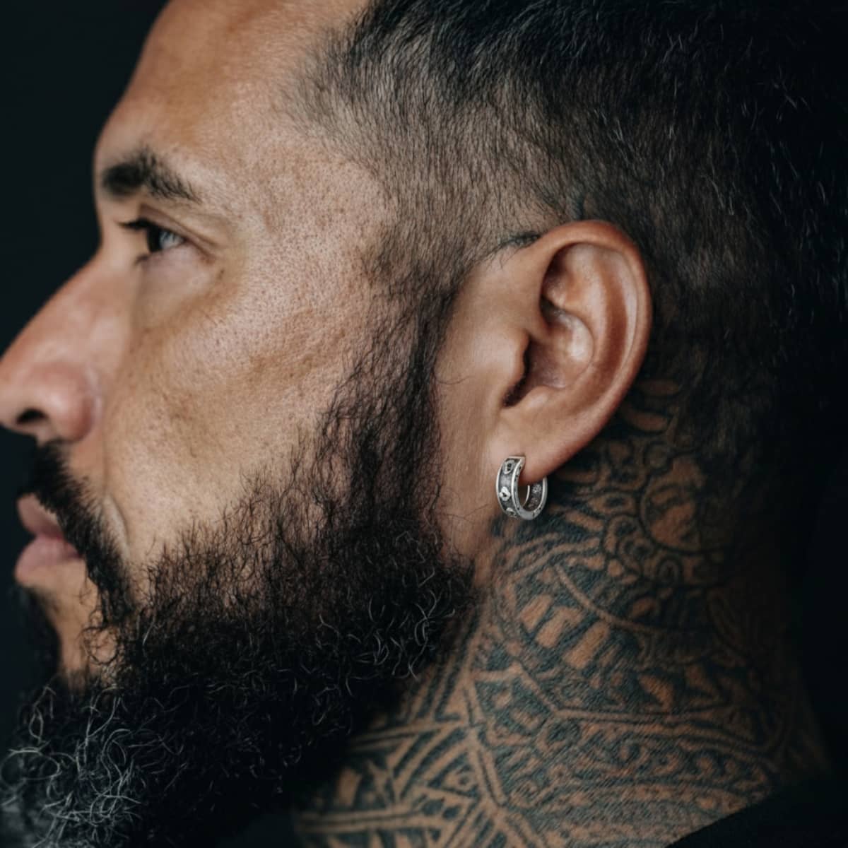 Poker Card Ace of Spades Skull Hoop Earrings Worn by Male Model Side