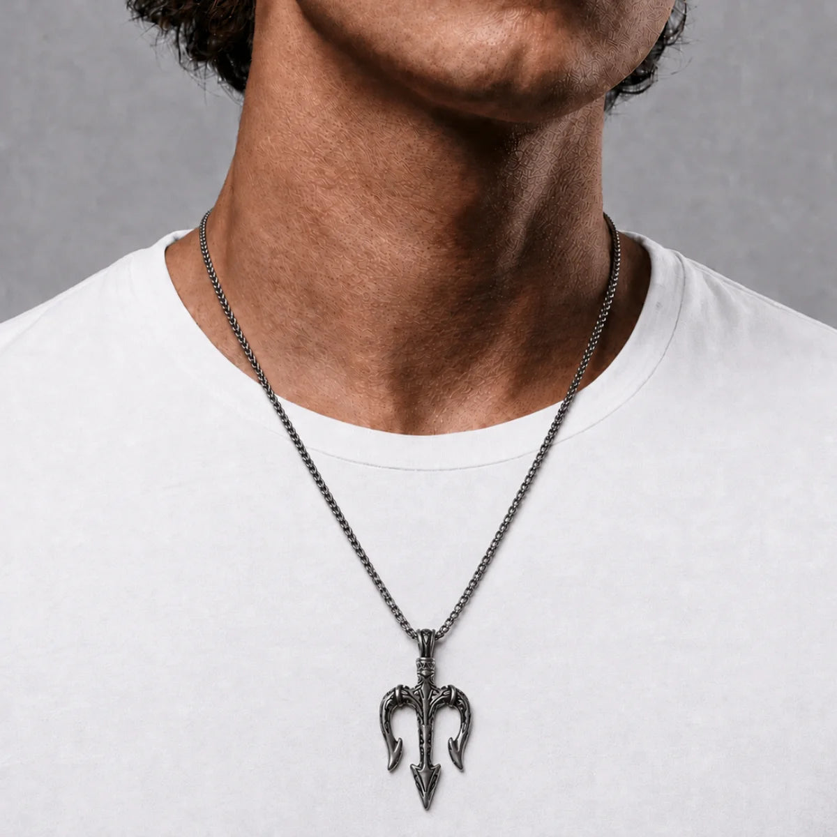 Poseidon Trident Pendant Necklace Silver Worn by Male Model Chest View