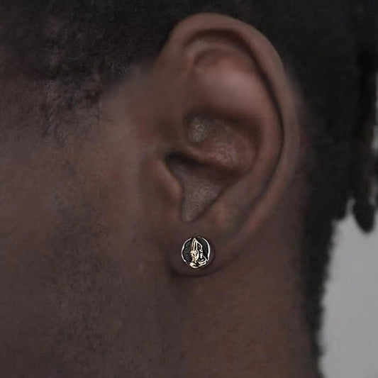 Praying Hands Earrings Gold Worn by Male Model Close Up
