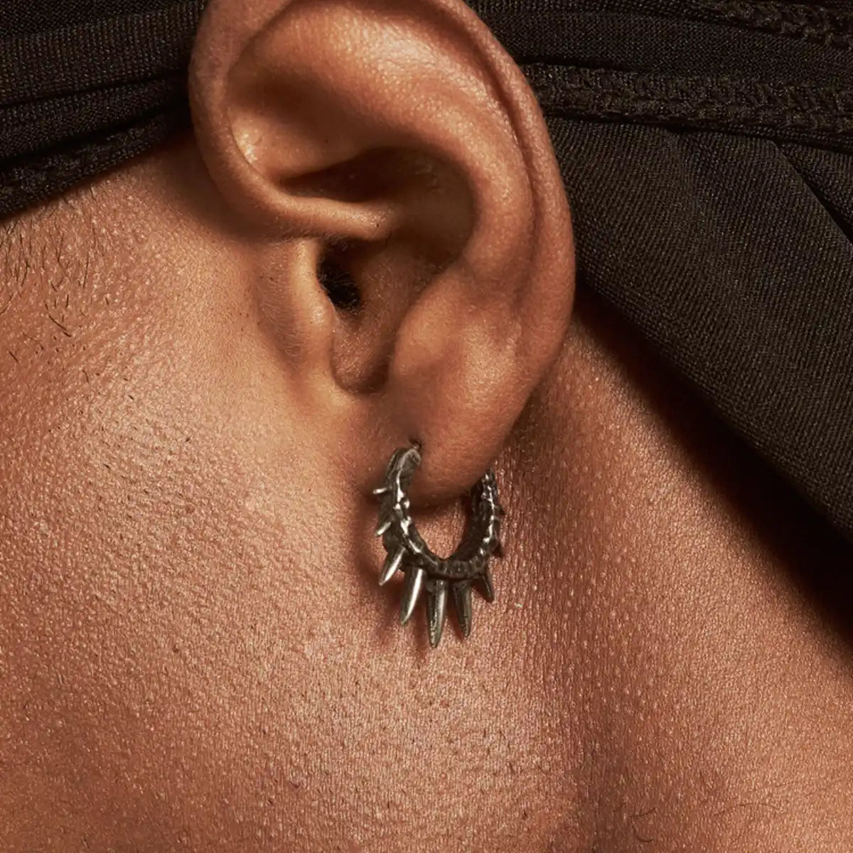 Punk Spike Hoop Earrings Worn by Male Model Close up