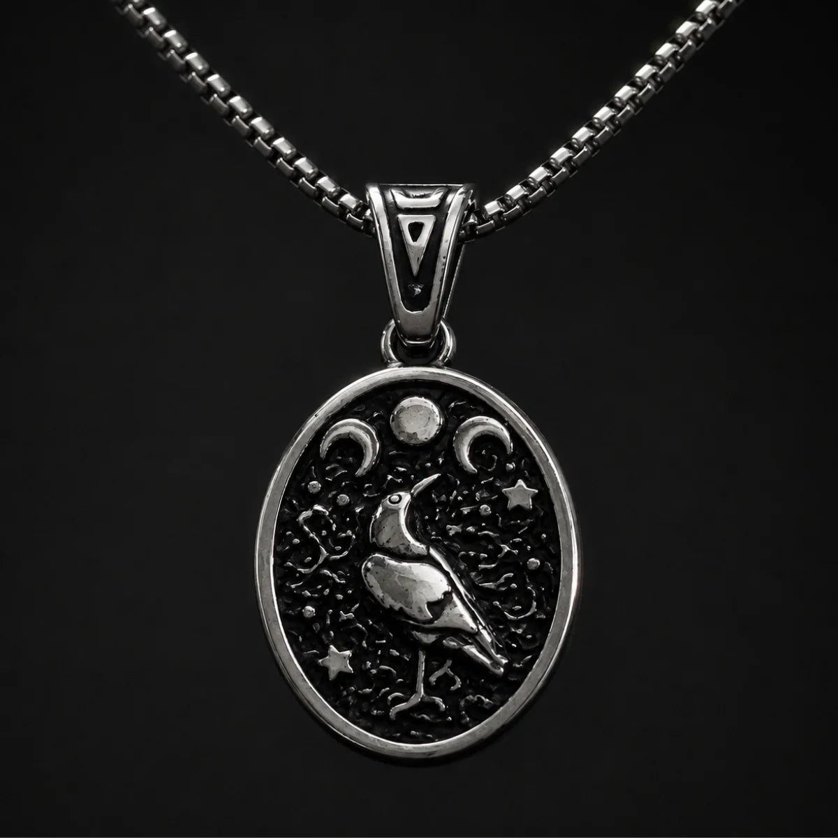 Raven Moon Pendant Necklace Silver Close Up Black Background