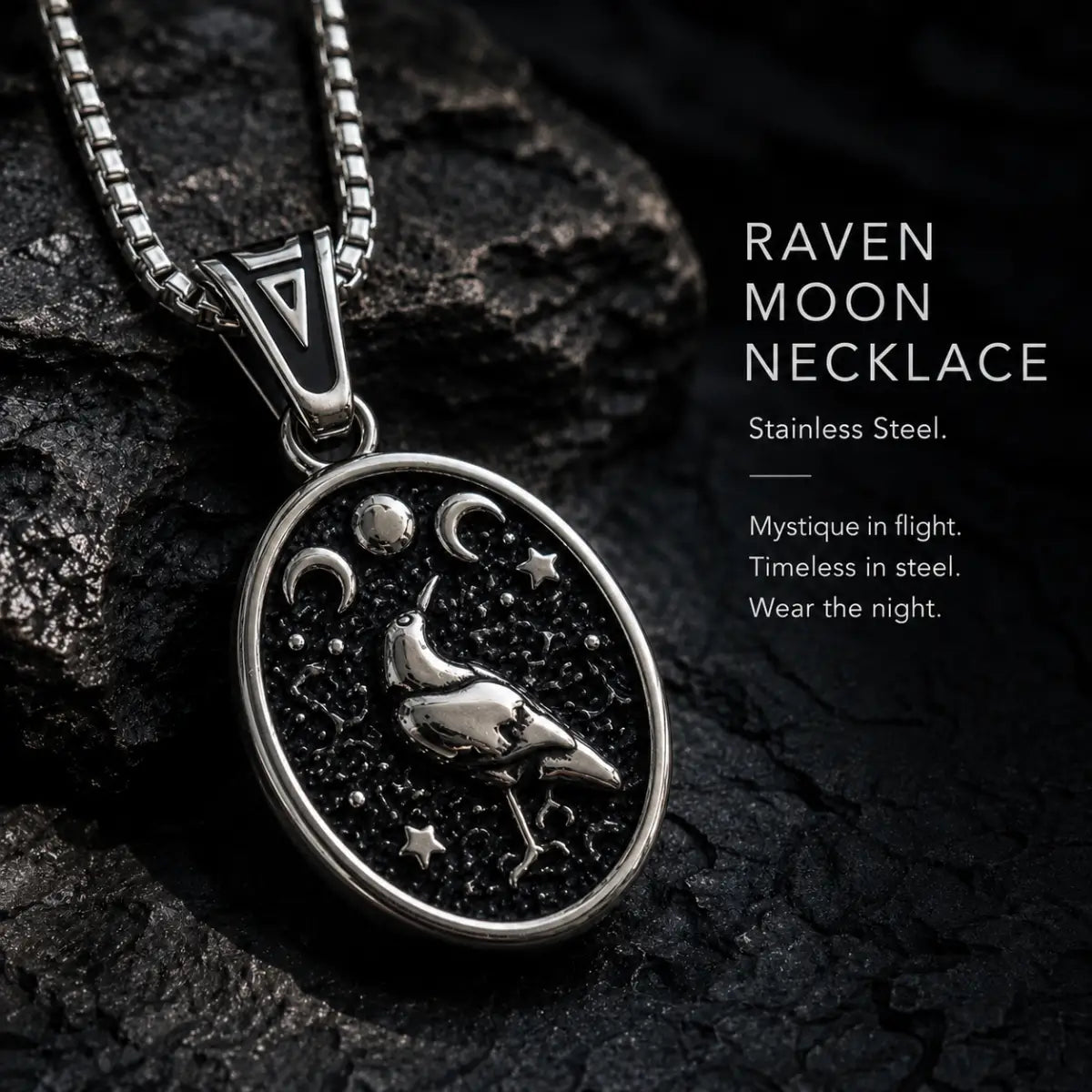 Raven Moon Pendant Necklace Silver Displayed on Stone Surface