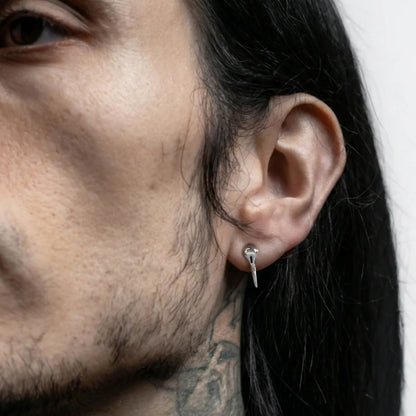 Raven Skull Stud Earrings Worn by Male Model