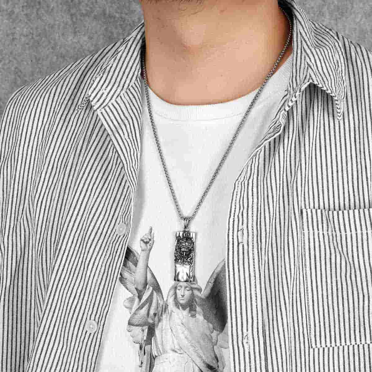 Rectangular Jesus Pendant with Crown of Thorns Pendant with Chain Worn by Model Xenos Jewelry