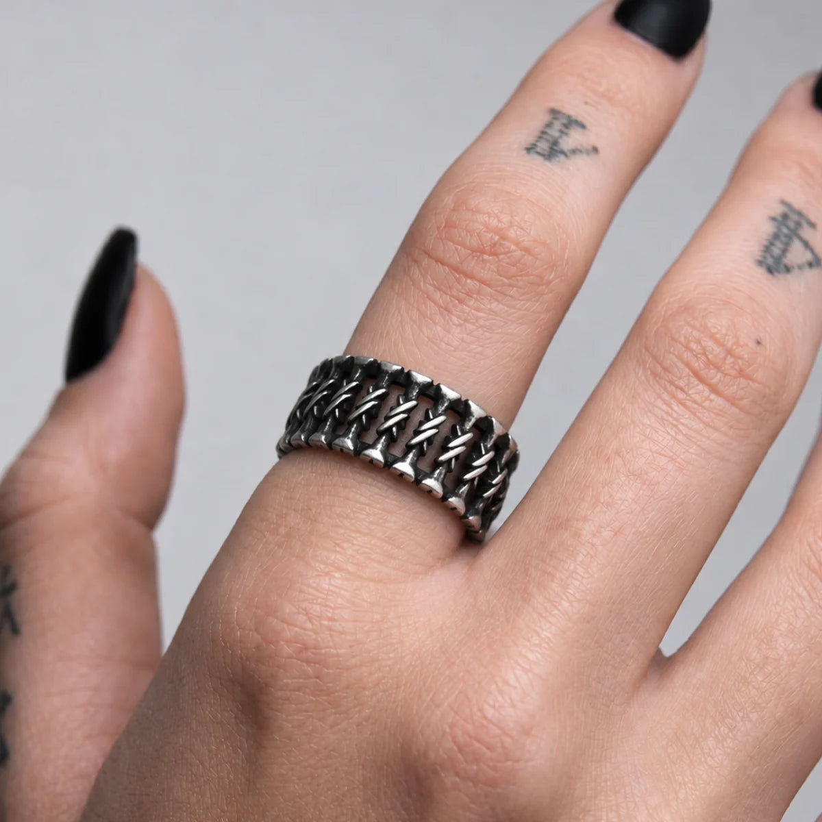 Ribcage Spine Ring Silver Worn on Middle Finger Hand View