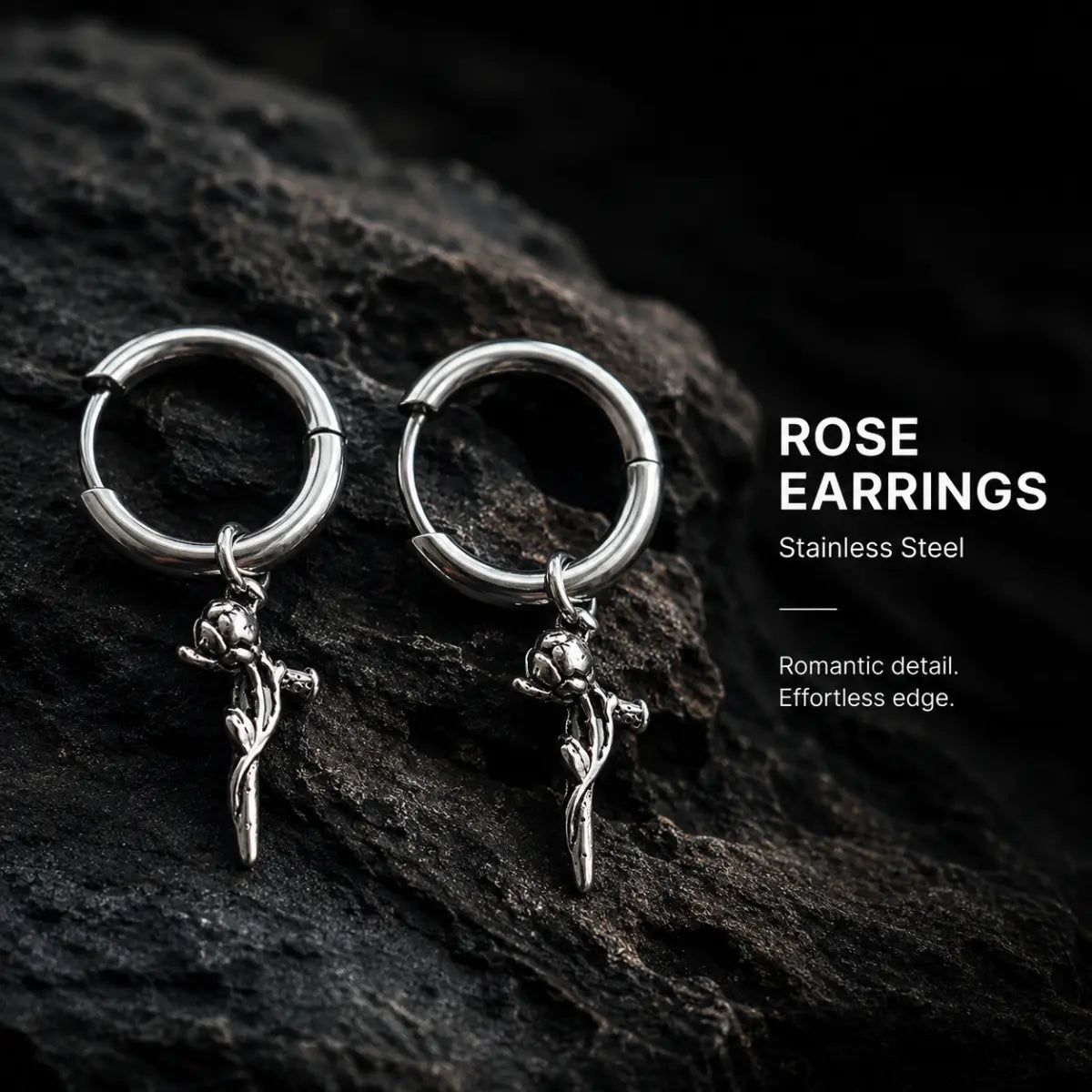 Rose Sword Drop Hoop Earrings Silver Pair Displayed on Stone Surface