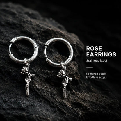 Rose Sword Drop Hoop Earrings Silver Pair Displayed on Stone Surface