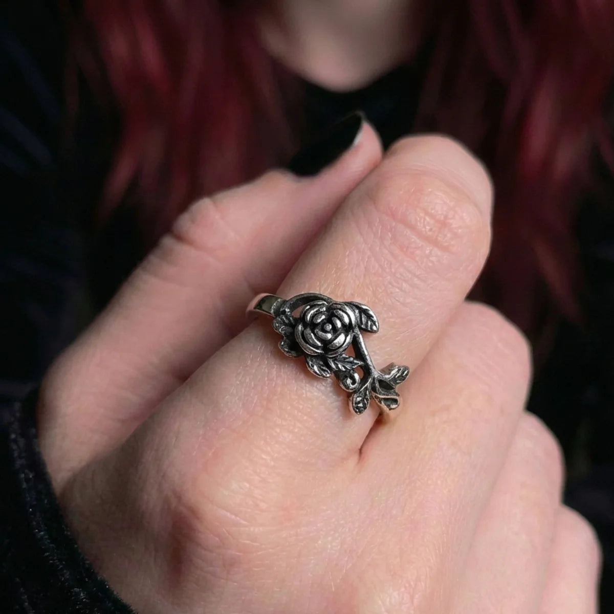 Rose and Thorn Ring Worn by Female Model