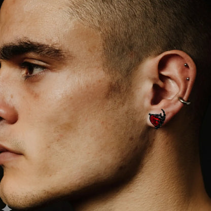 Ruby Heart Skeleton Hand Stud Earrings Worn by Male Model Side