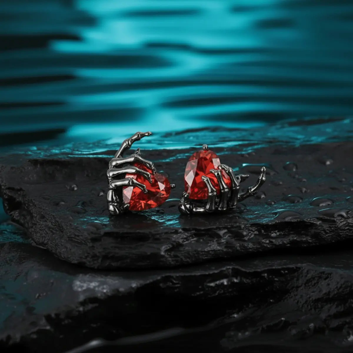 Ruby Heart Skeleton Hand Stud Earrings
