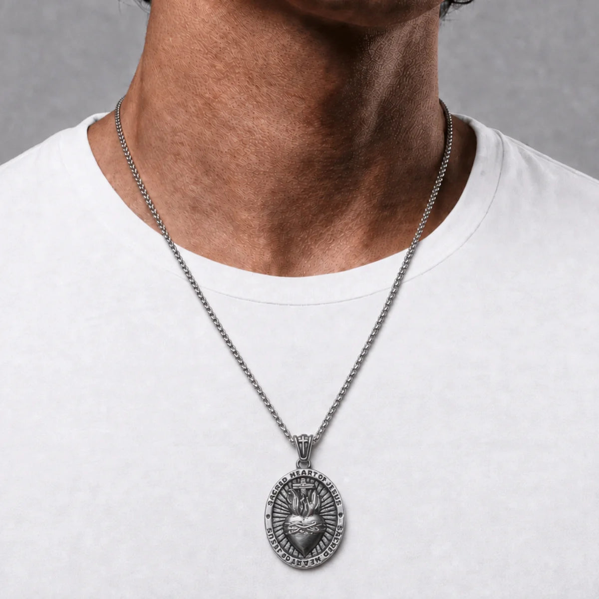 Sacred Heart Medal Necklace Silver Worn by Male Model Chest View