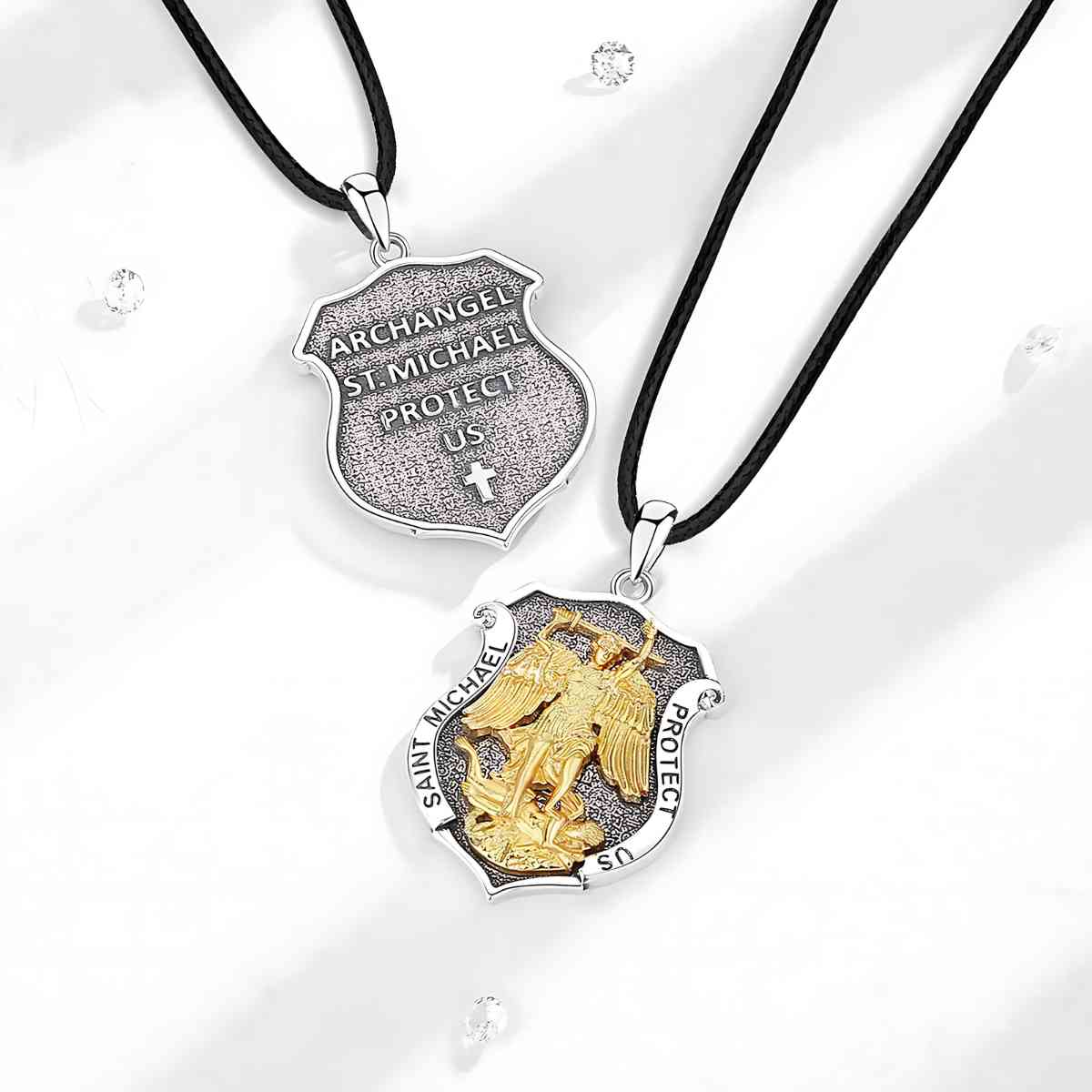 Saint Michael Shield Pendant Necklace Displayed on White Surface Xenos Jewelry