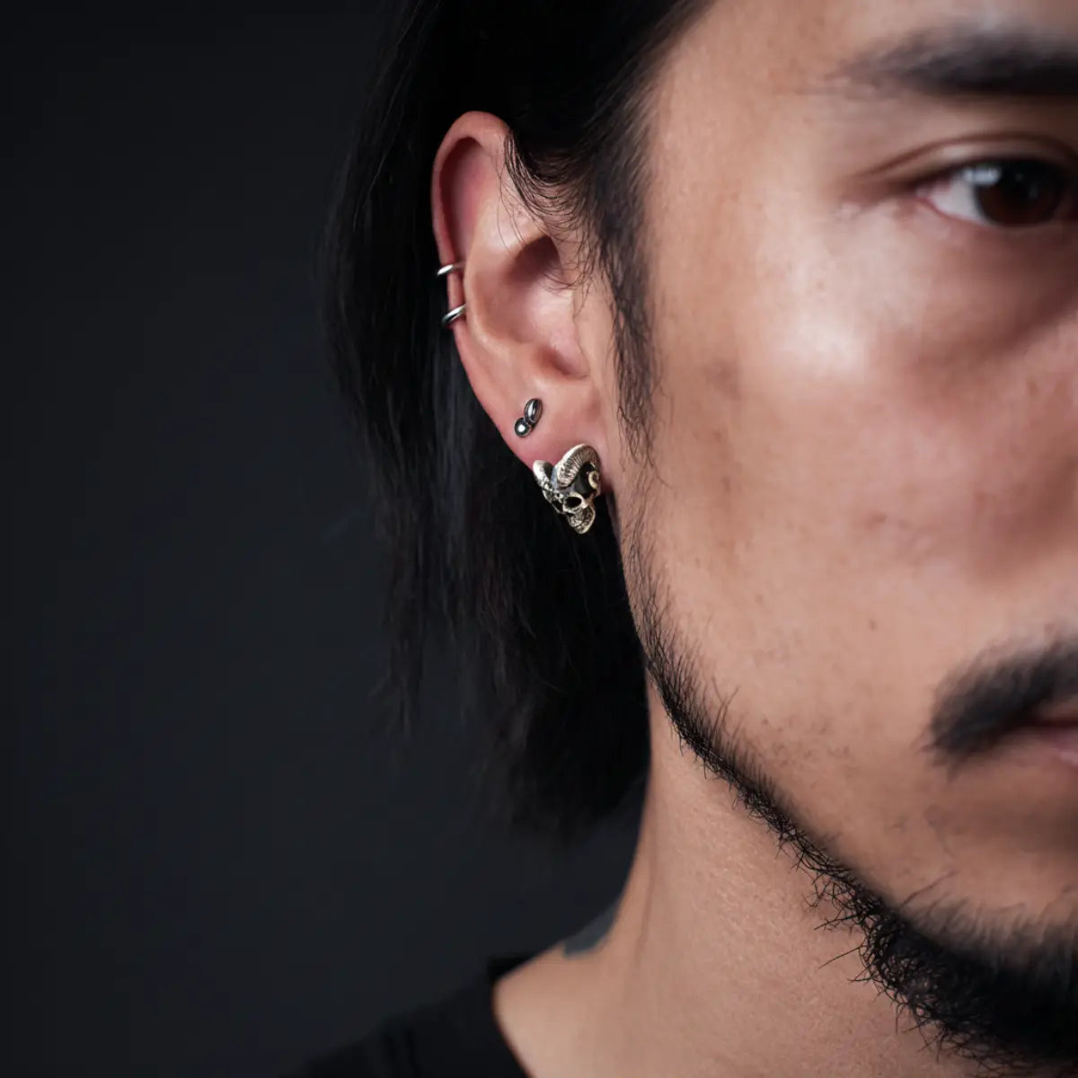Satan Skull Stud Earrings Worn by Male Model