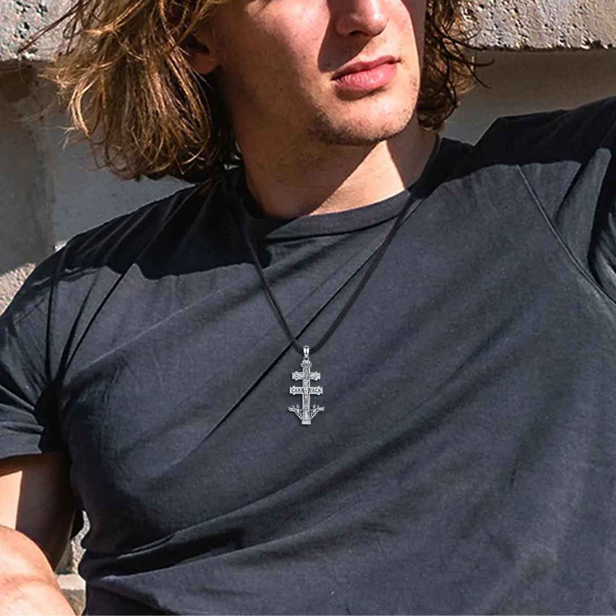 Silver Caravaca Cross Necklace with Cherubs and Priest Worn by Model Xenos Jewelry