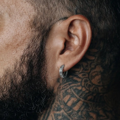 Silver Celtic Knot Huggie Hoop Earrings Worn by Male Model Side