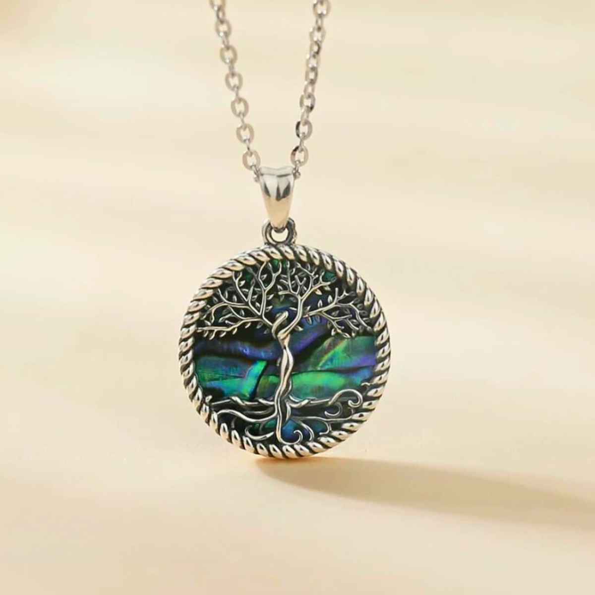 Silver Family Tree Necklace with Abalone Shell Inlay Details Xenos Jewelry