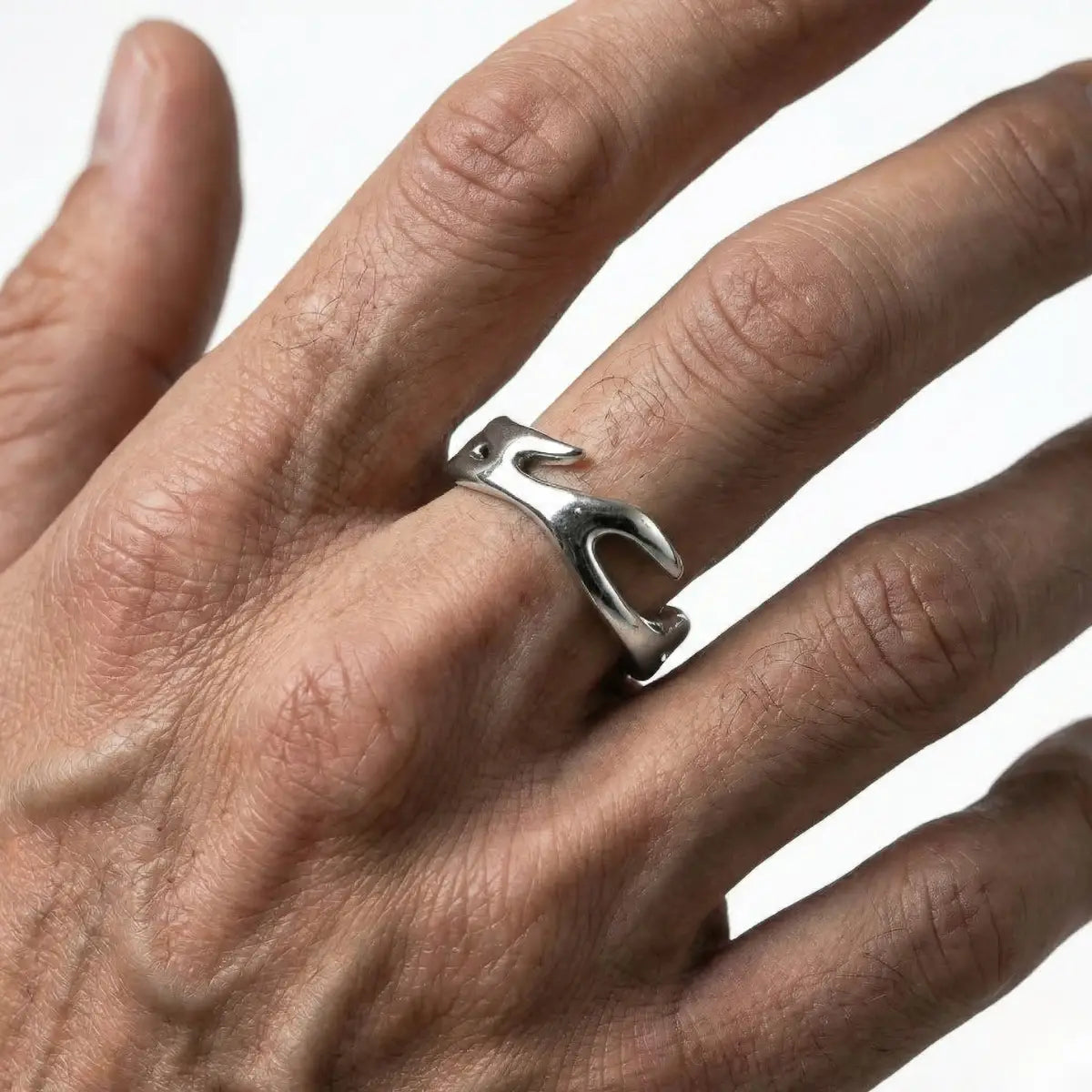 Silver Flame Ring Worn by Male Model Close Up