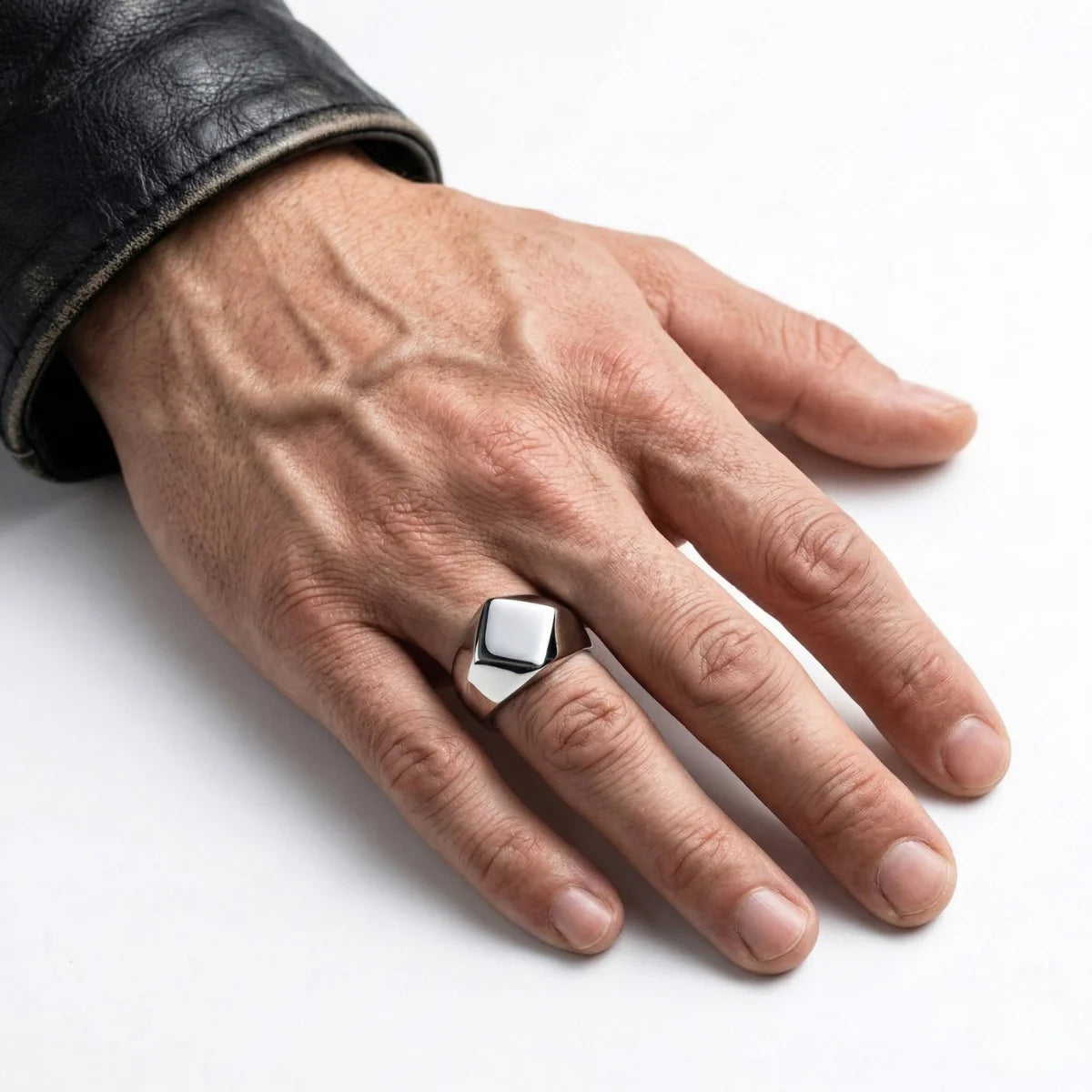 Silver Geometric Signet Ring Worn by Male Model Close Up