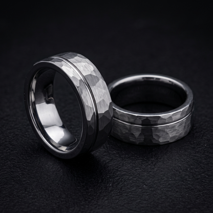 Silver Hammered Tungsten Wedding Band Close Up Black Background