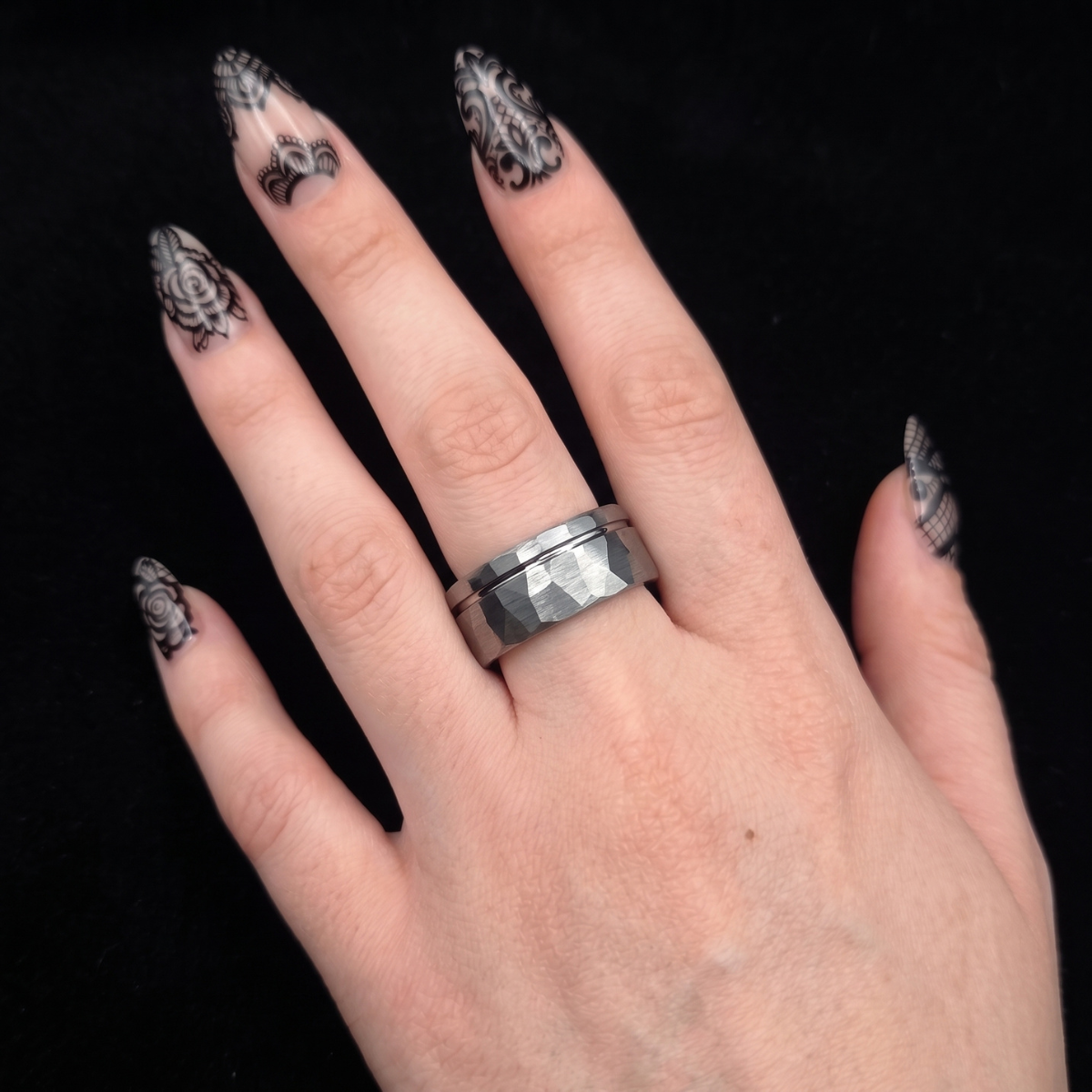 Silver Hammered Tungsten Wedding Band Worn on Female Hand