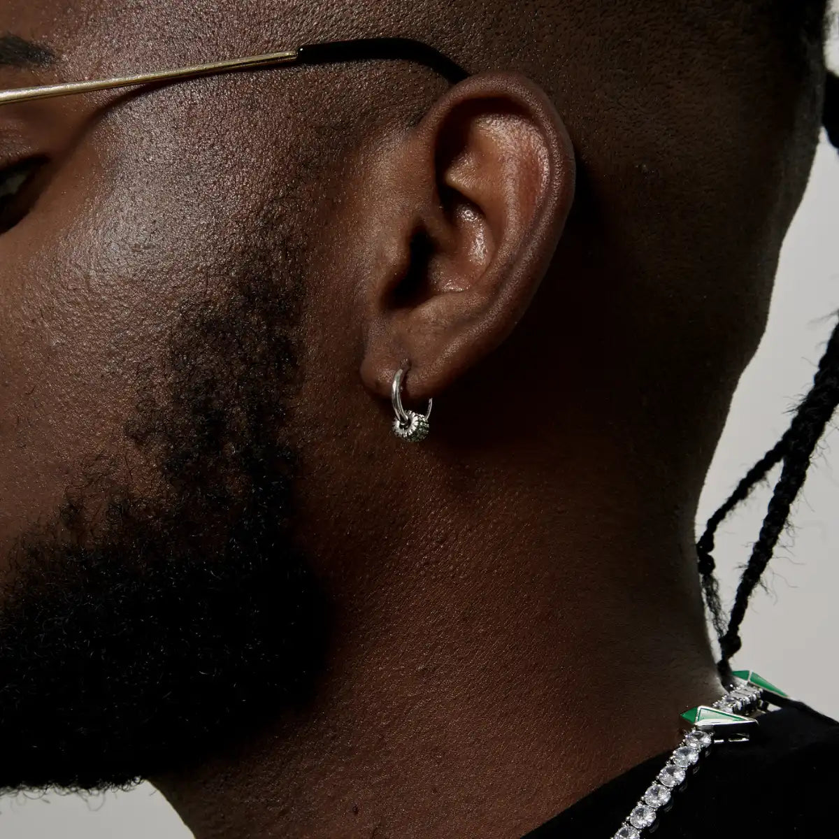 Silver Hoop Earrings with Iced Out Rings Worn by Male Model