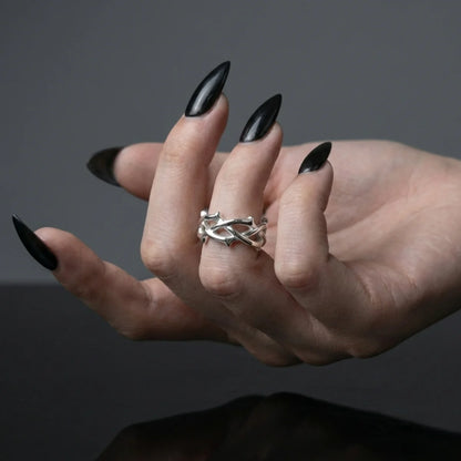Silver Minimalist Thorns Ring Worn by Female Model