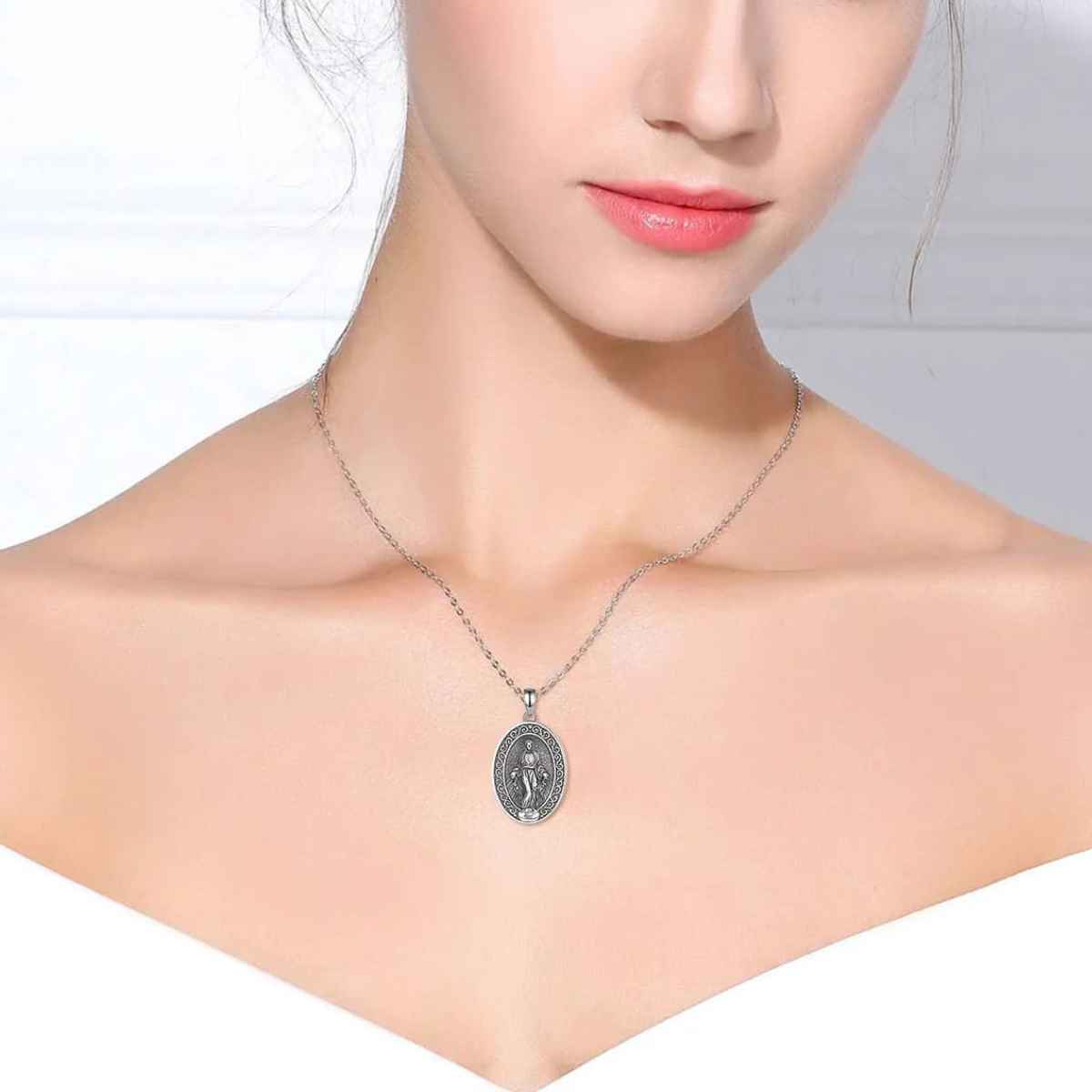 Silver Miraculous Medal Necklace Oval Worn by Model Xenos Jewelry