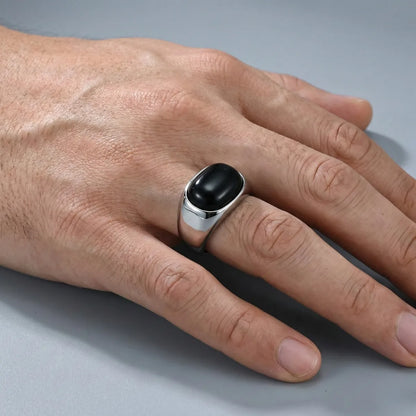 Silver Ring with Black Stone Worn by Male Model Close Up