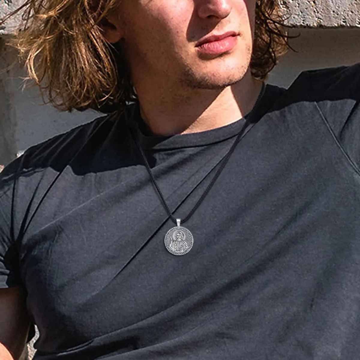 Silver San Judas Pendant Worn by Model Xenos Jewelry