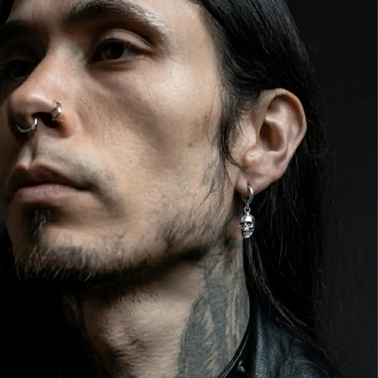 Silver Skull Head Hoop Earrings Worn by Male Model Front