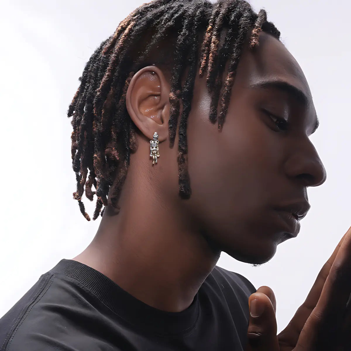 Skeleton dangle earrings sterling silver worn by male model