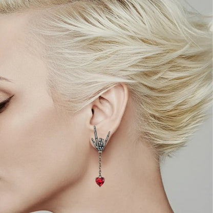 Skeleton Hand Drop Earrings Worn by Female Model