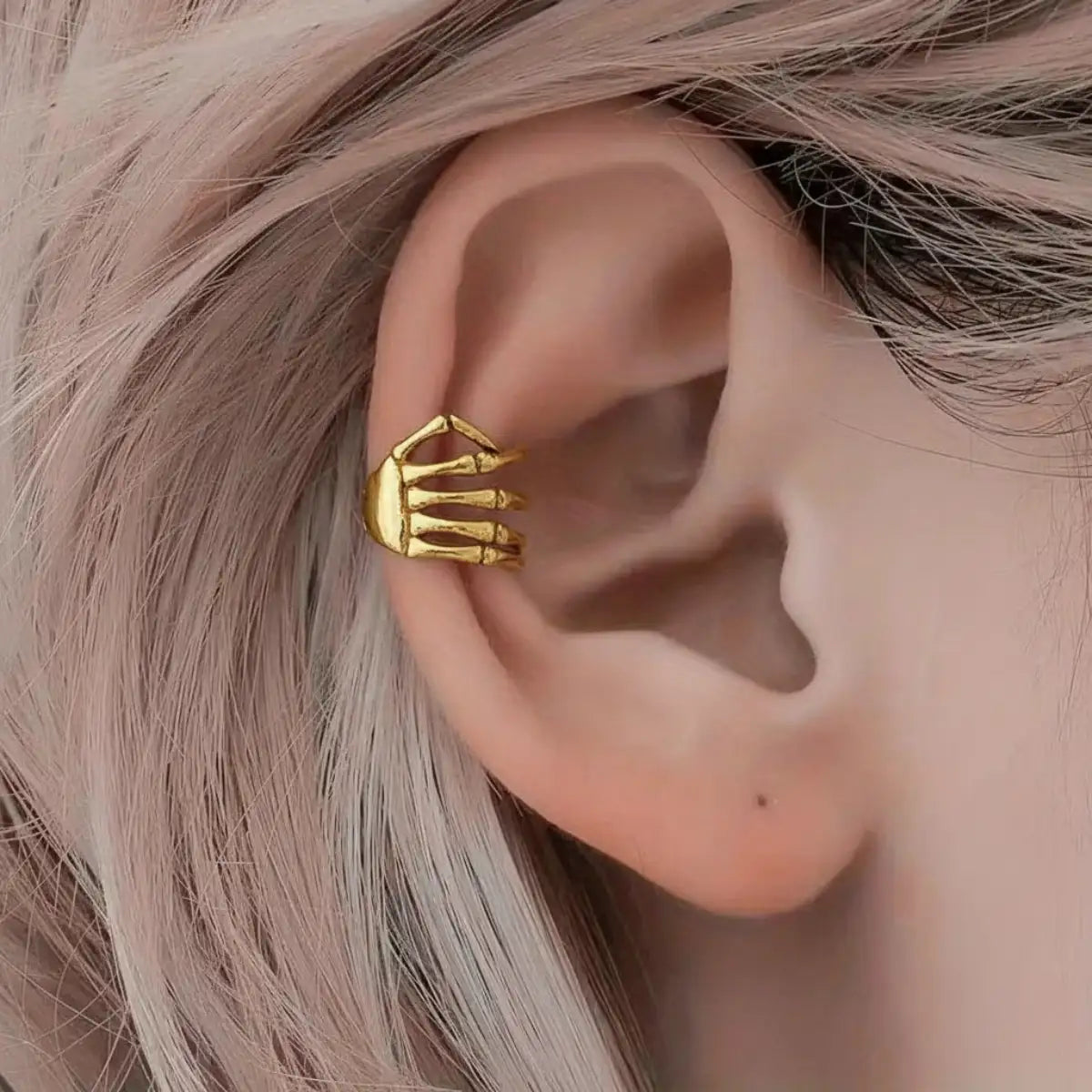 Skeleton Hand Ear Cuff Gold Worn by Female Model