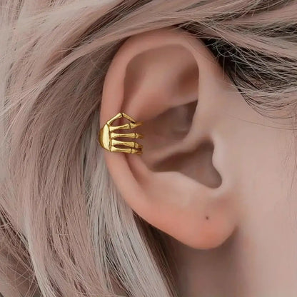 Skeleton Hand Ear Cuff Gold Worn by Female Model
