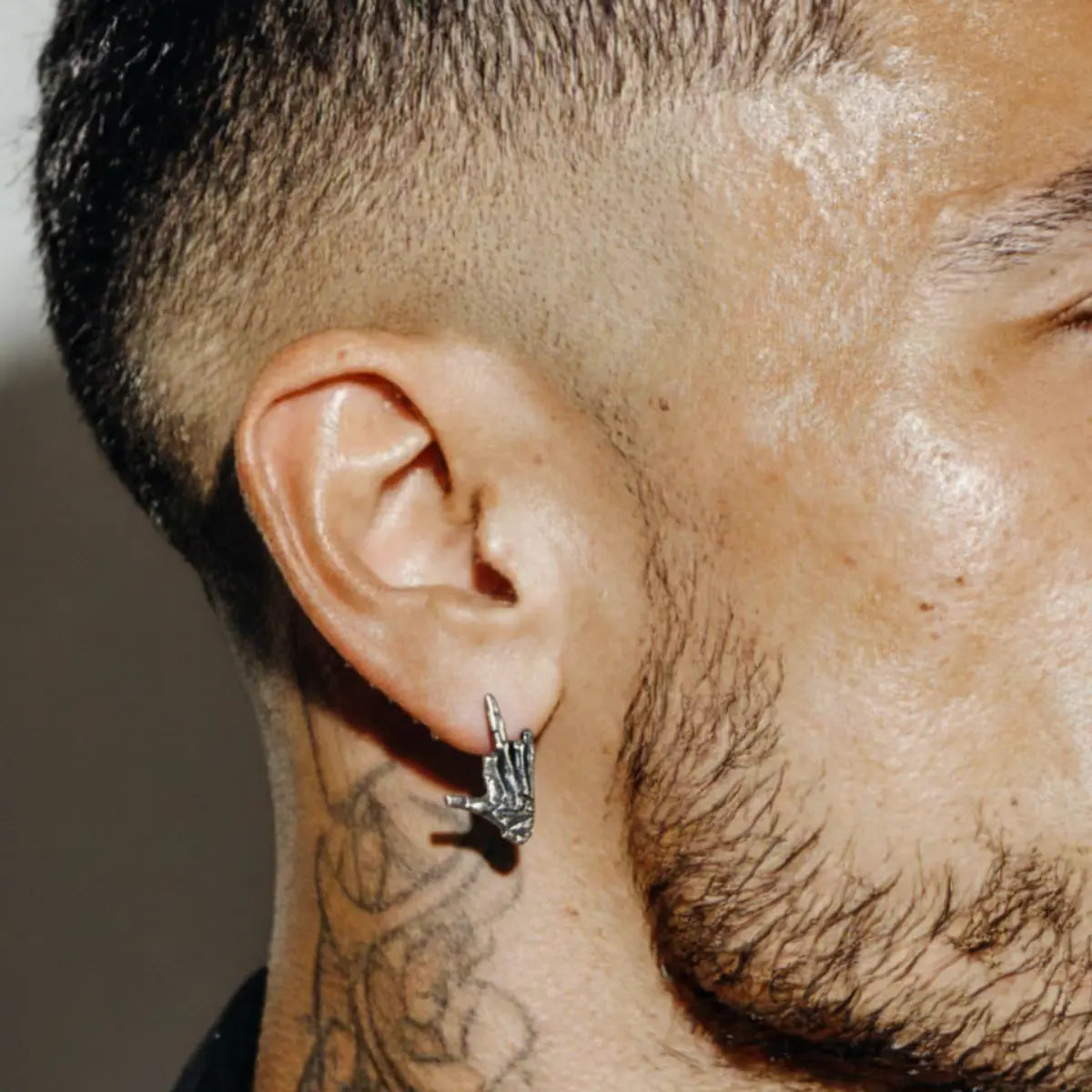 Skeleton Middle Finger Stud Earrings 925 Silver Worn by Male Model
