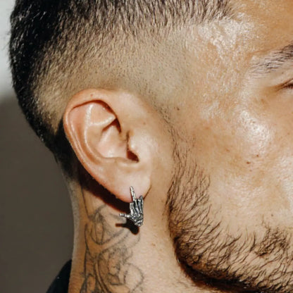 Skeleton Middle Finger Stud Earrings 925 Silver Worn by Male Model