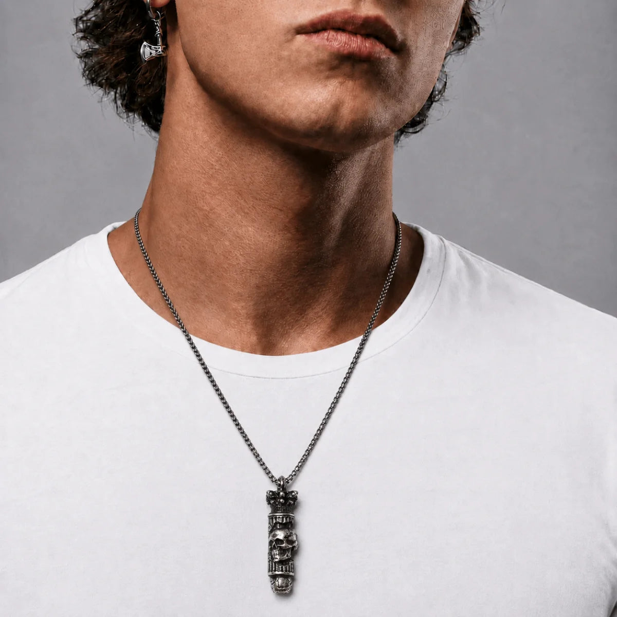 Skull Bullet Necklace Silver Worn by Male Model Far View