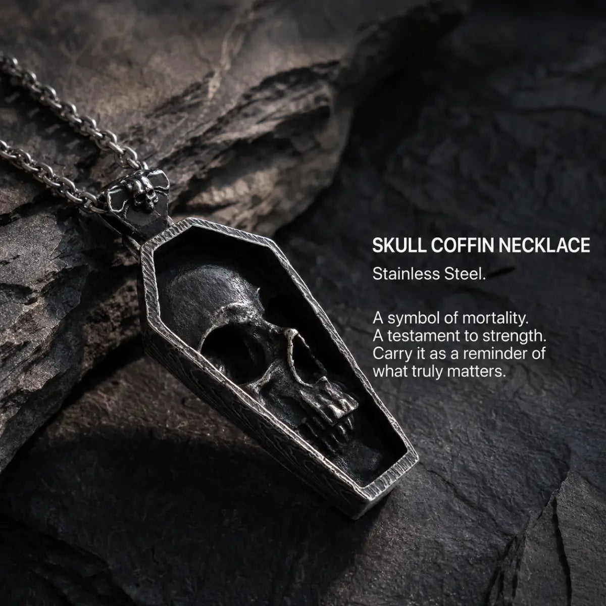 Skull Coffin Necklace Silver Displayed on Stone Surface
