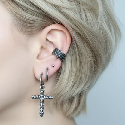 Skull Cross Dangle Hoop Earrings Worn by Female Model