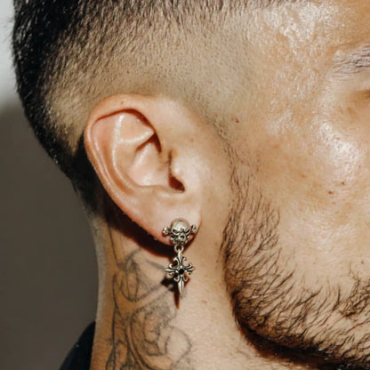 Skull Cross Drop Stud Earrings Black CZ Worn by Male Model