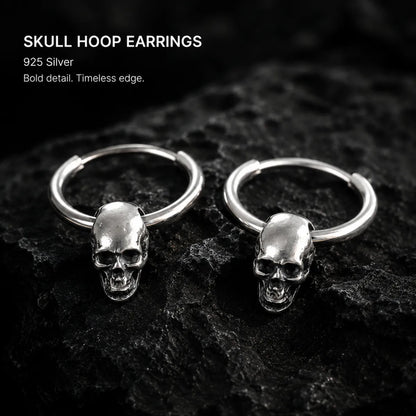 Skull Hoop Earrings 925 Silver Pair Displayed on Stone Surface