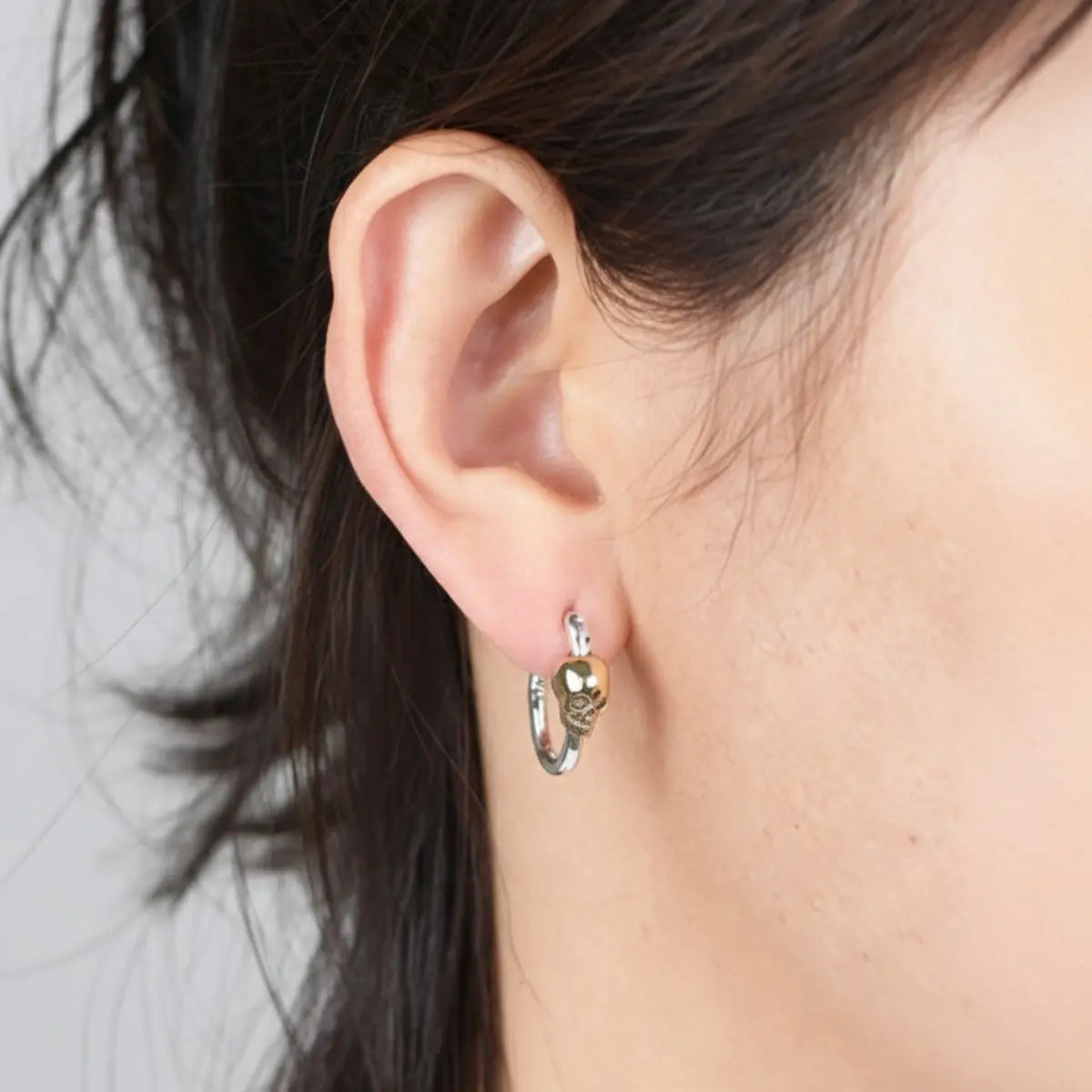 Skull Hoop Earrings for Women Worn by Female Model