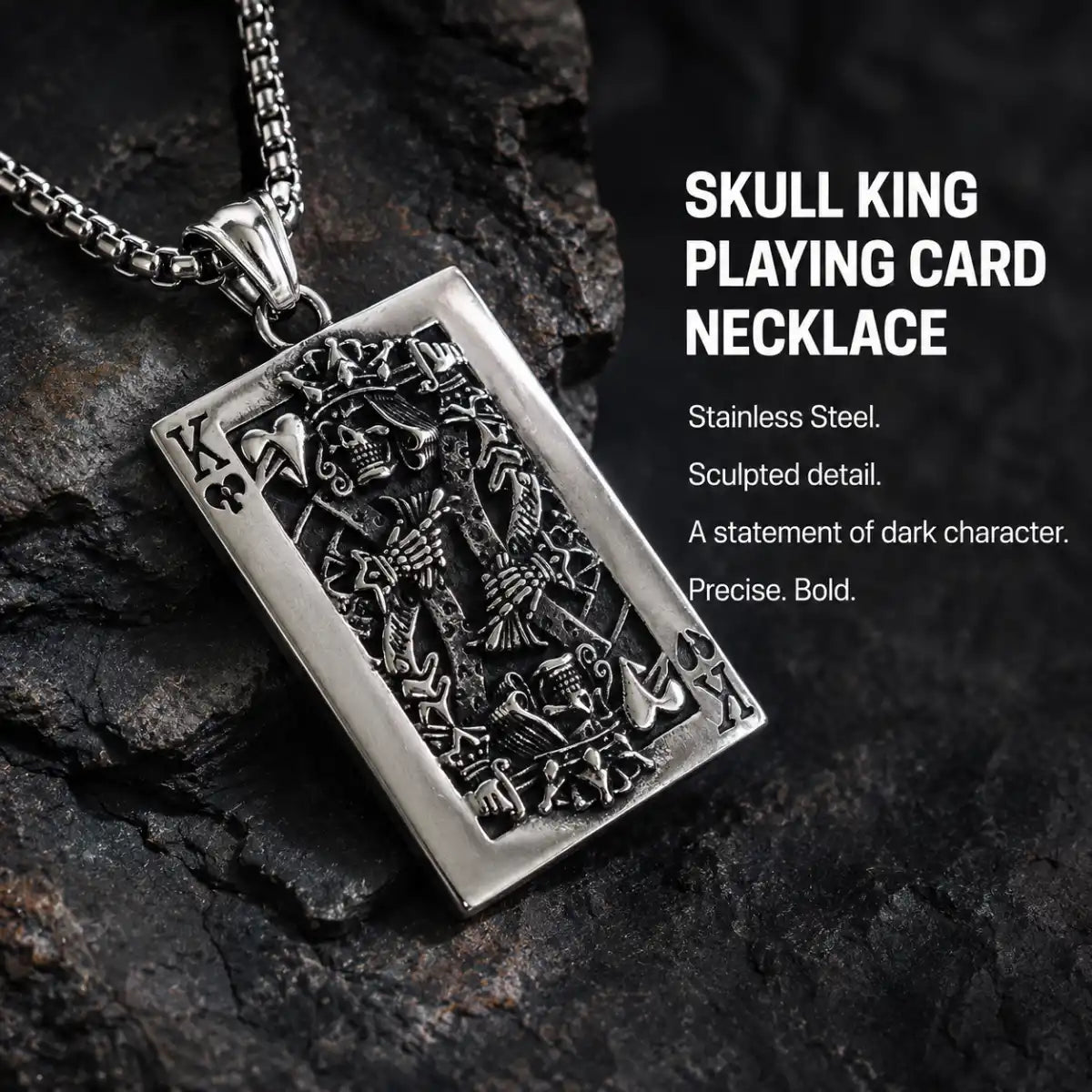 Skull King Playing Card Pendant Necklace Silver Displayed on Stone Surface