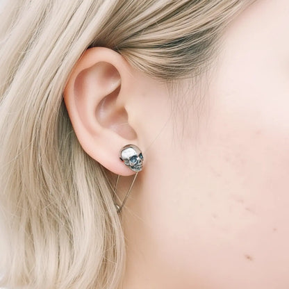 Skull Safety Pin Earrings Worn by Female Model