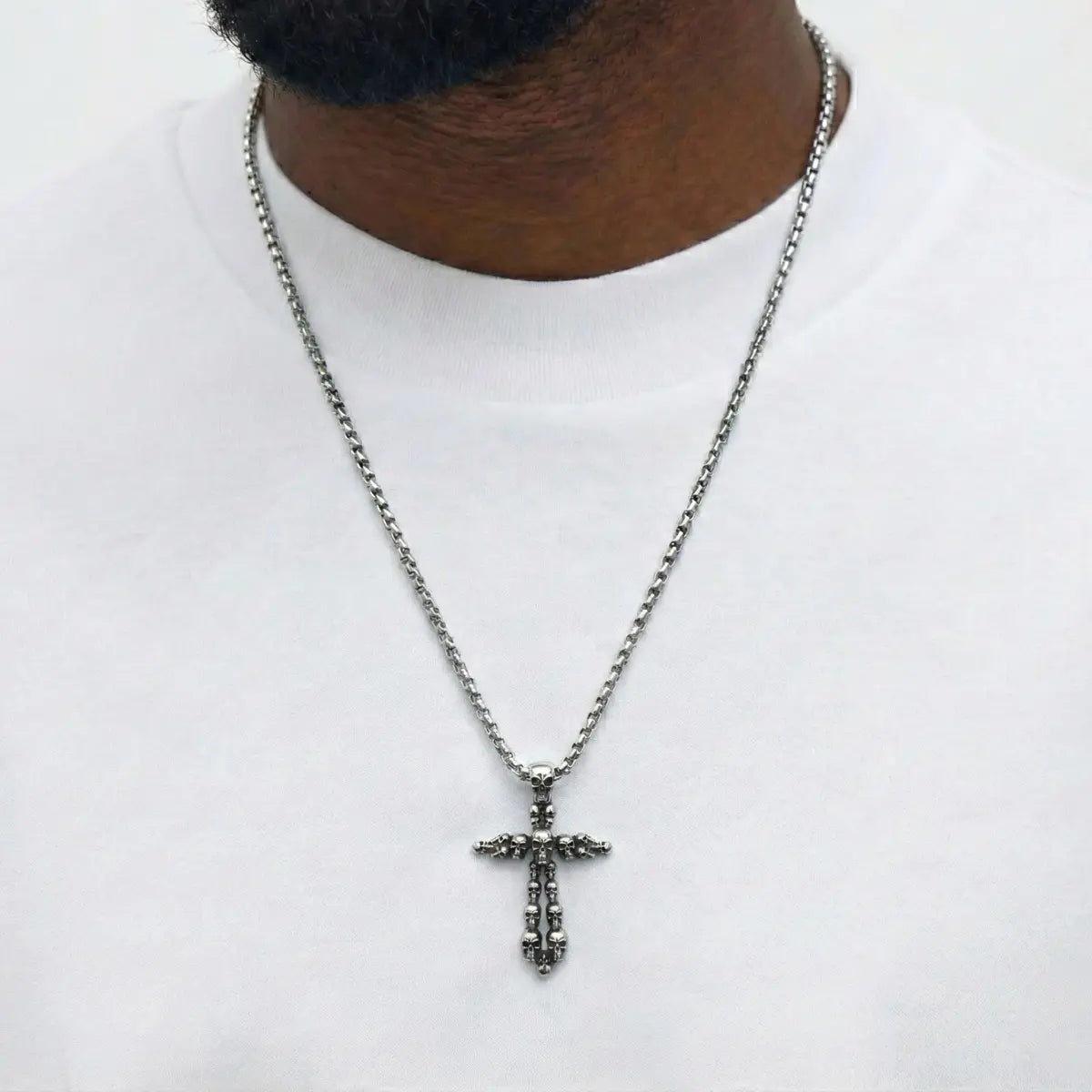 Small Skull Cross Necklace Worn by Male Model